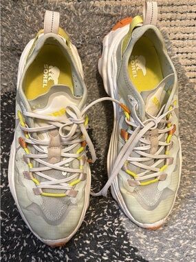 Sorel Women’s White and Yellow Athletic Sneakers with Orange Accents